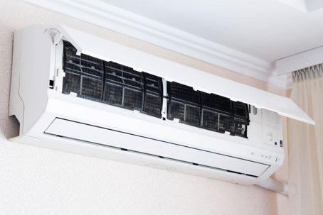 Home air conditioner open for cleaning.