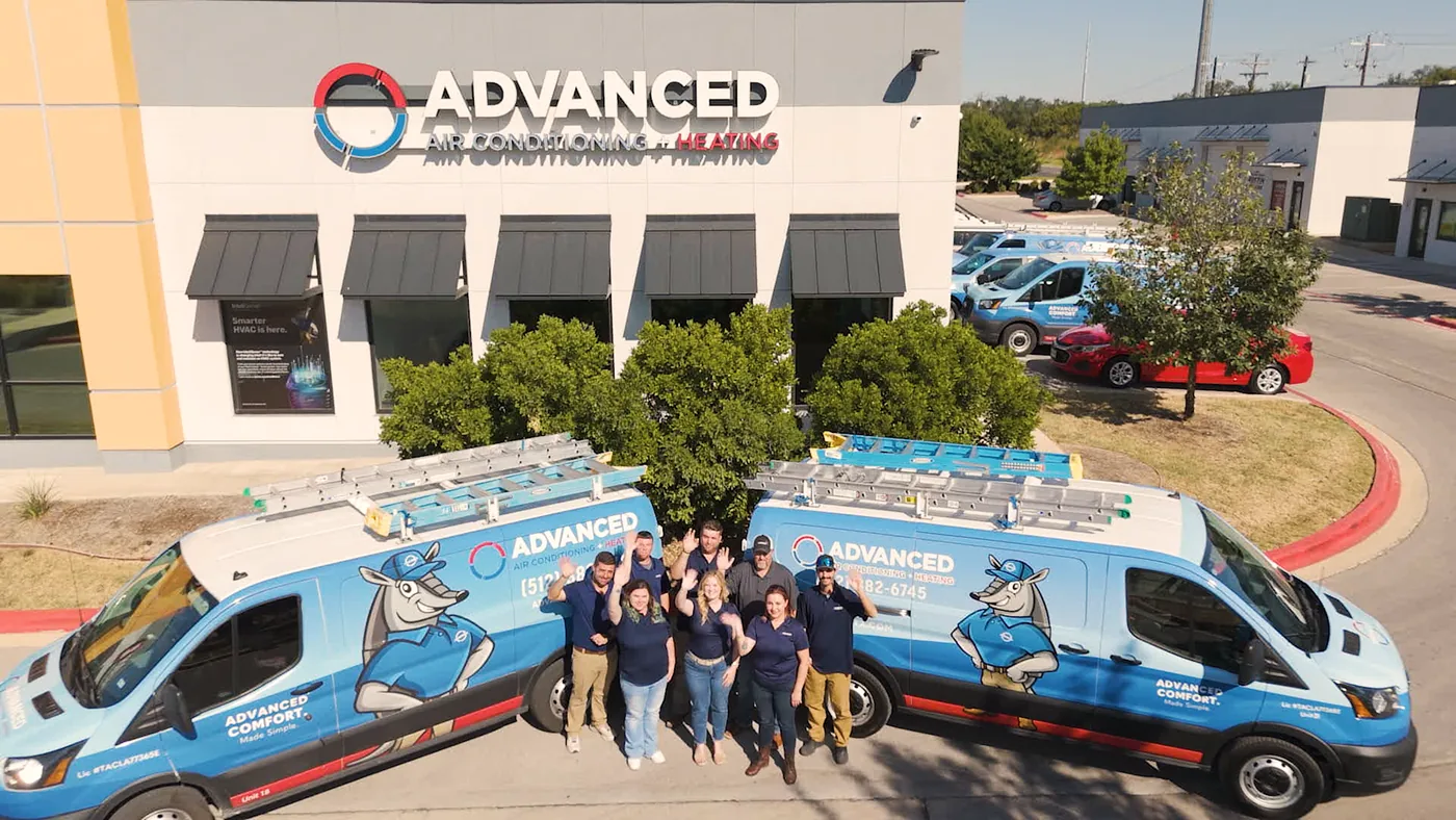 Full Advanced Air Conditioning + Heating team and fleet outside their Cedar Park headquarters